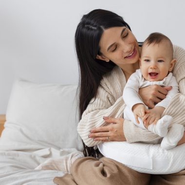 front-view-mother-holding-newborn-baby